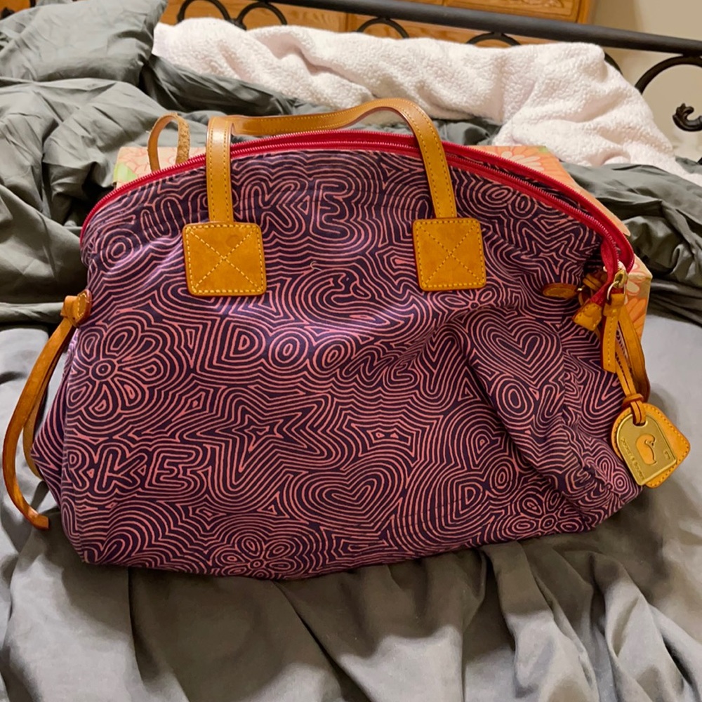 Original Dooney and Burke perfect Condition.